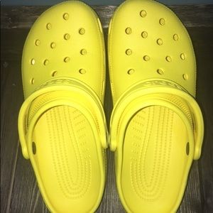 Yellow and neo min crocs